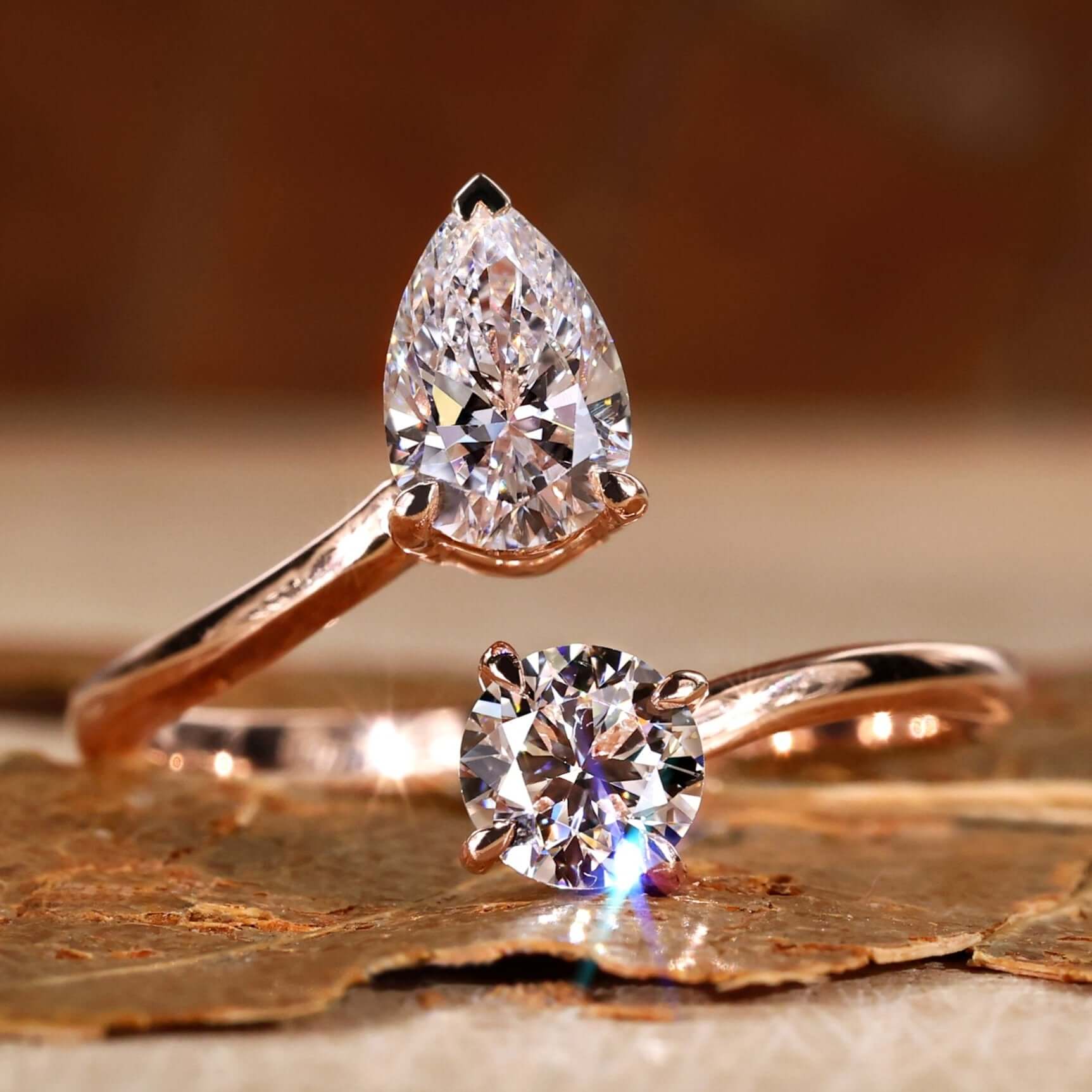 Toi et moi engagement ring with an elegant open gap bypass setting for timeless charm.