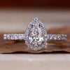 Pear Halo Engagement Ring with a stunning halo ring setting for a timeless and elegant style.