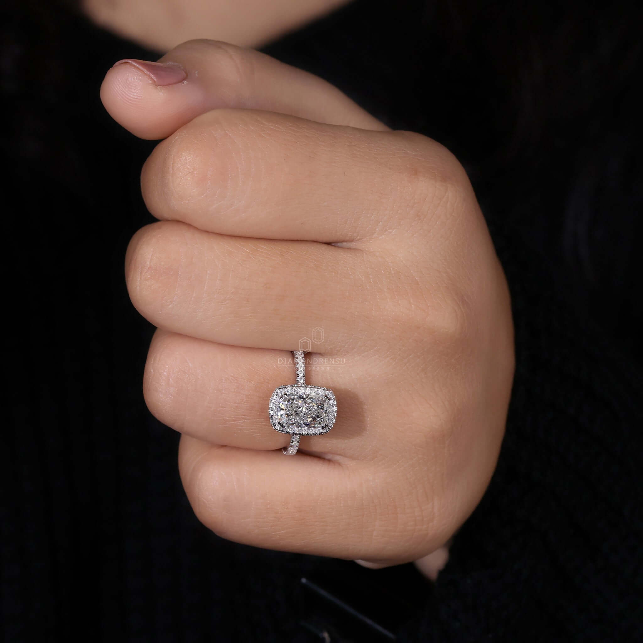 Cushion cut ring featuring pave setting and halo ring for a unique engagement ring in UK craftsmanship.