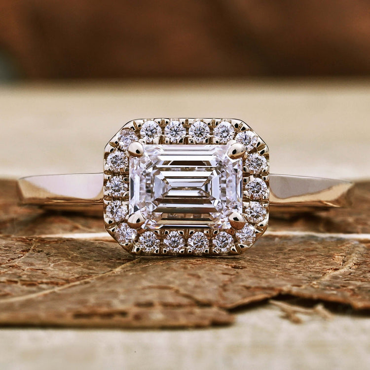 Emerald proposal ring with a timeless design for special moments.
