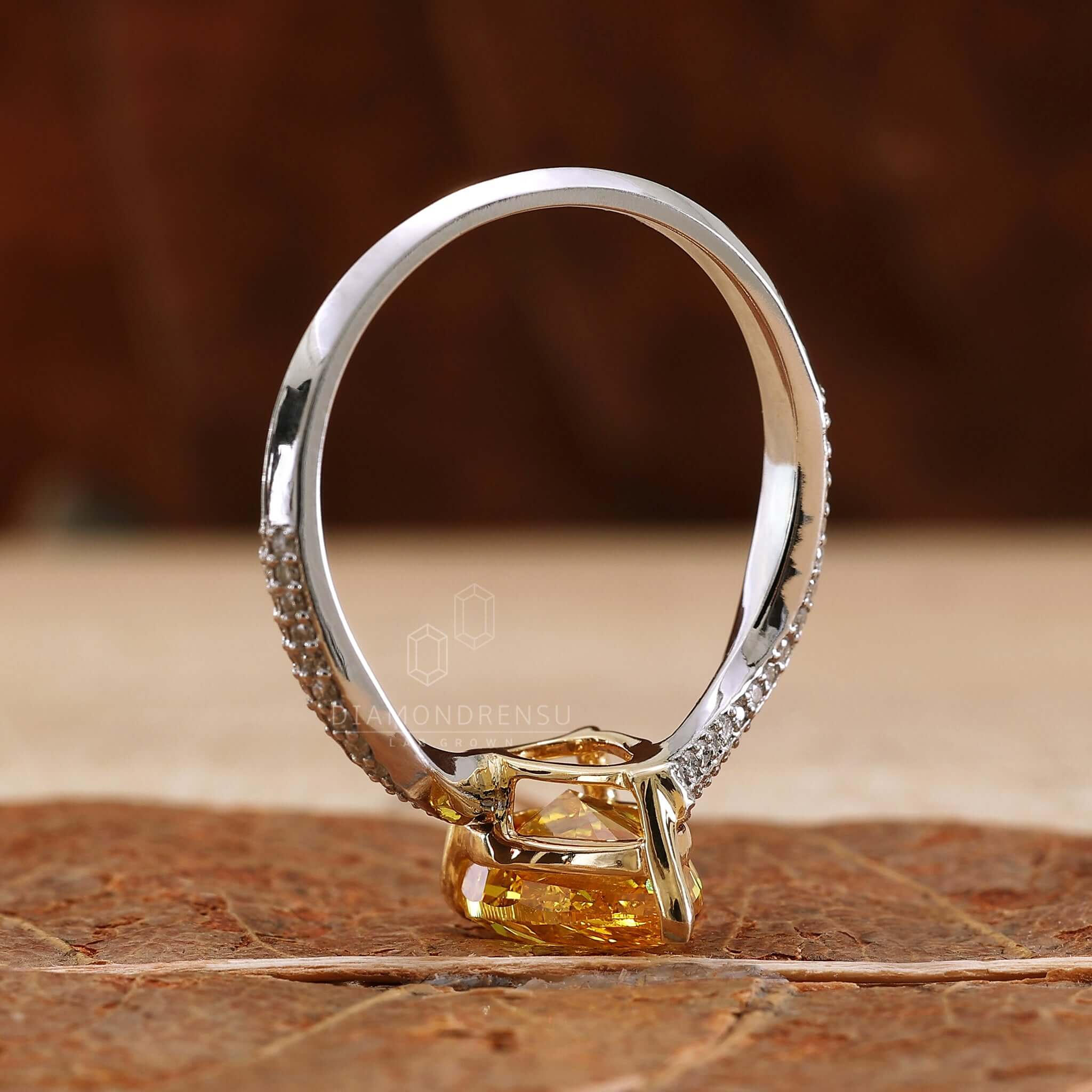 White gold engagement ring with a pear shape diamond ring