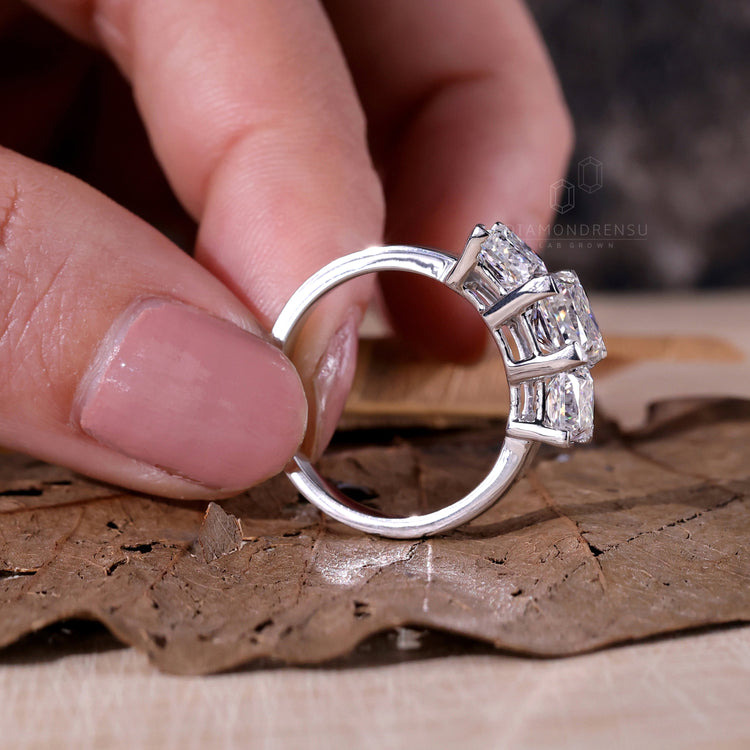 Three stone diamond ring in a diamondrensu UK engagement design.