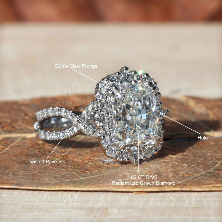 Handmade diamondrensu engagement ring with IGI certified stones.