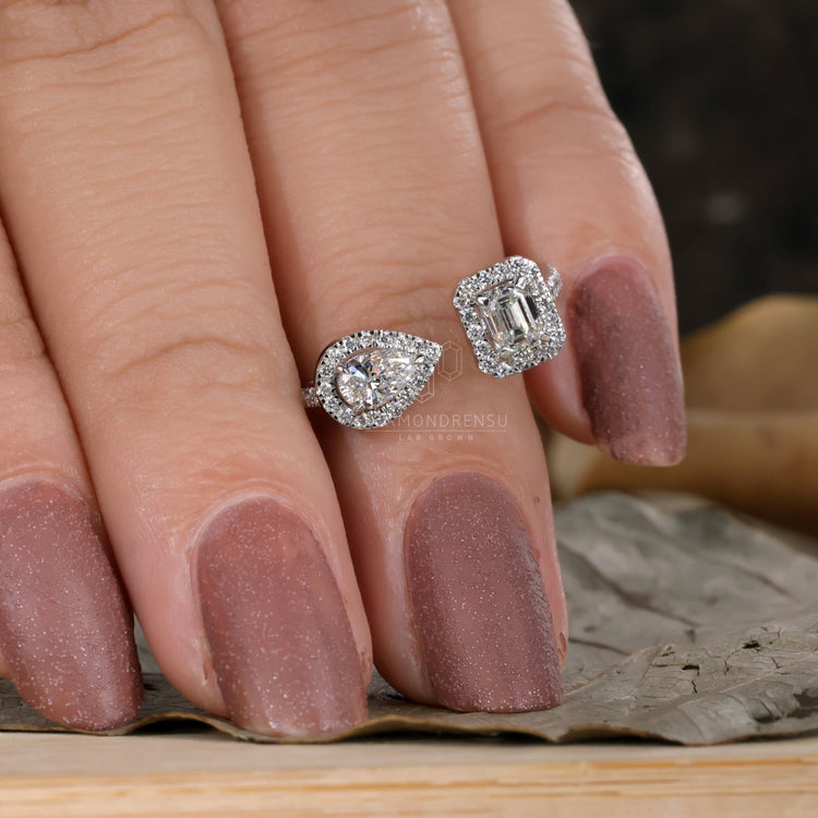 Emerald and Pear Cut Lab Grown Diamond Engagement Ring perfect
for modern brides.