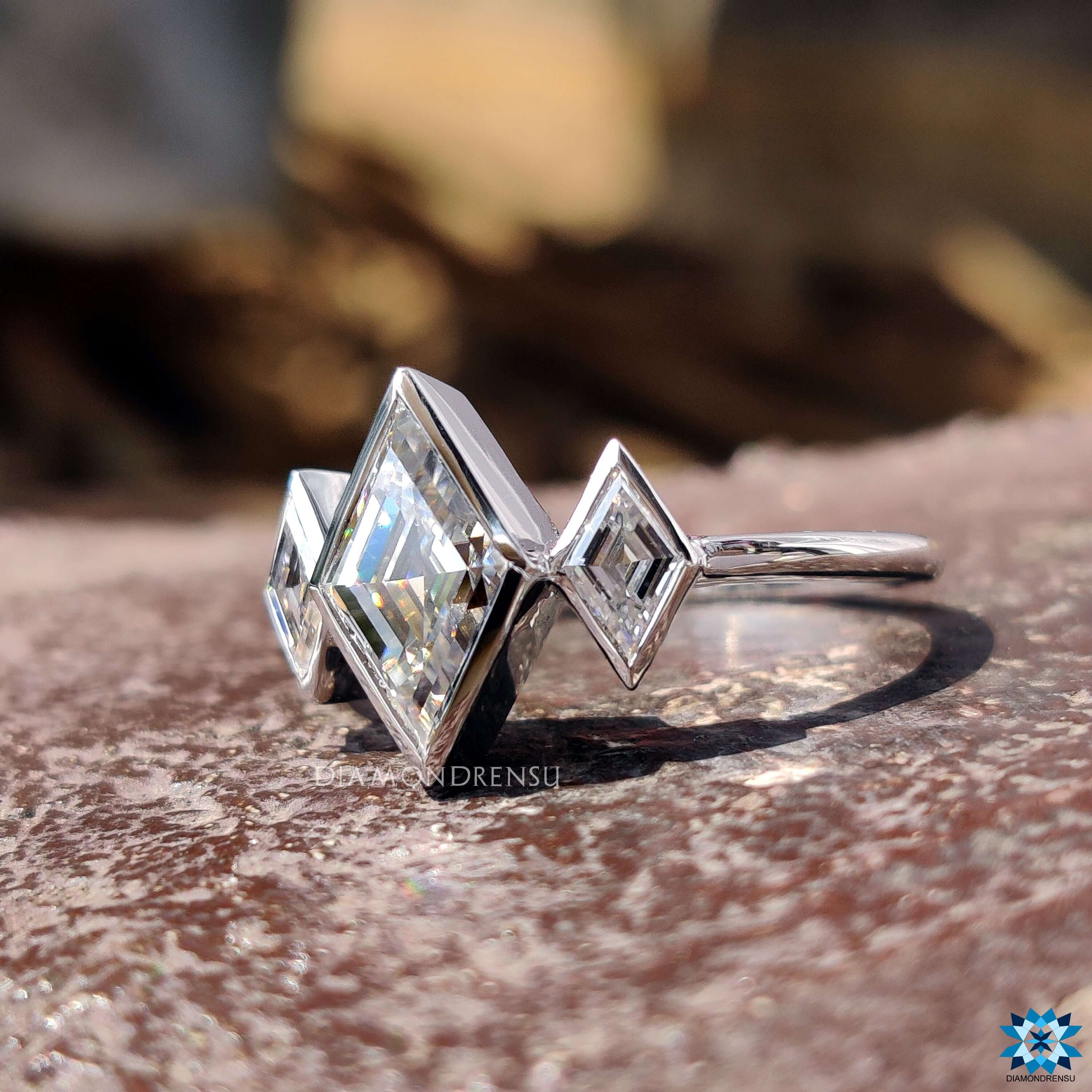 White gold lozenge cut engagement ring.