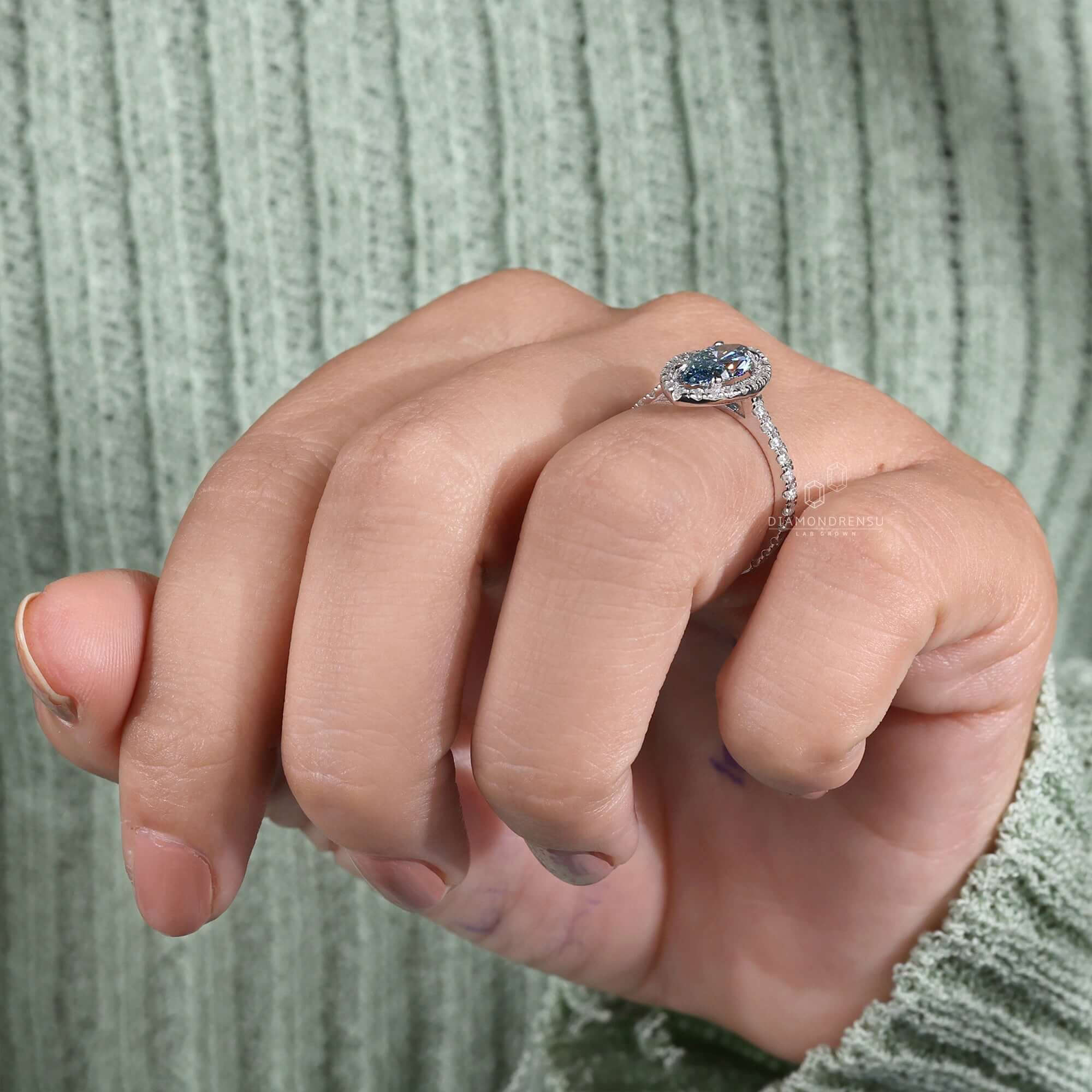 Halo ring setting combined with pave diamonds for unmatched sparkle.
