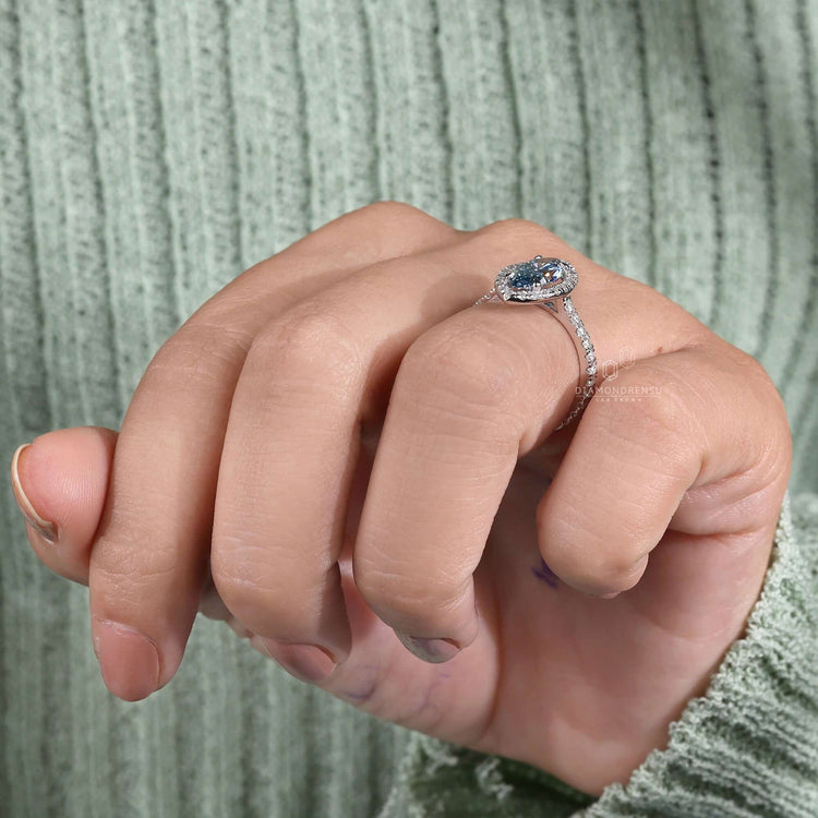 Halo ring setting combined with pave diamonds for unmatched sparkle.