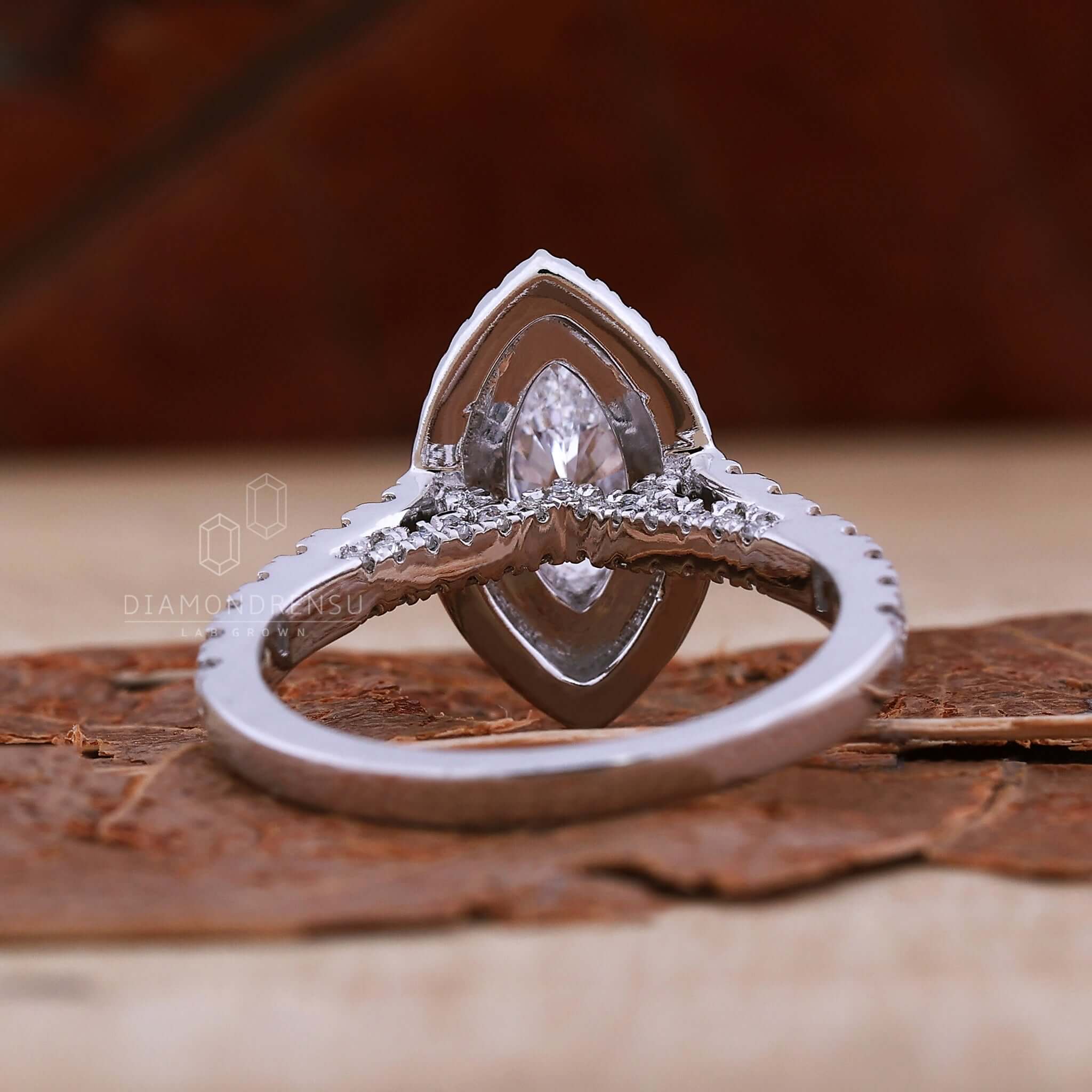 Double halo ring with v prong setting and lab grown diamond for modern elegance.
