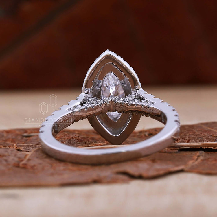 Double halo ring with v prong setting and lab grown diamond for modern elegance.