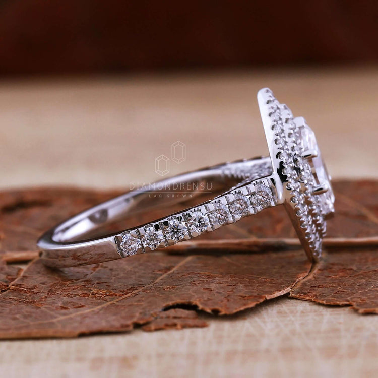 Marquise diamond with double halo engagement ring for added
brilliance and sophistication.