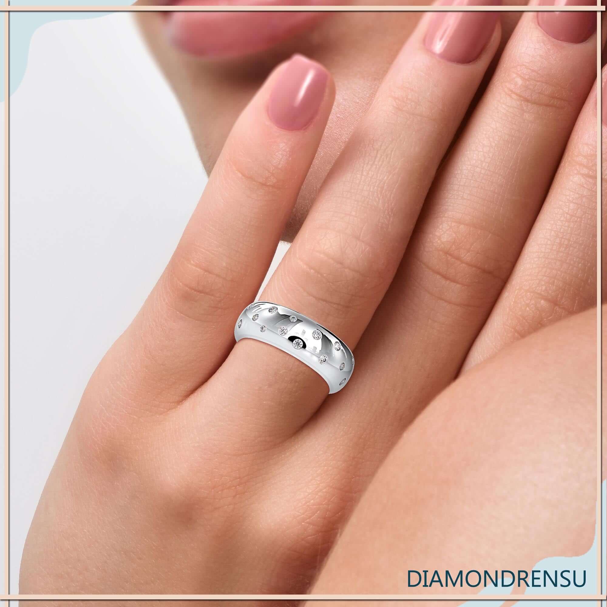 Rose gold flush setting wedding band for lab grown stones.
