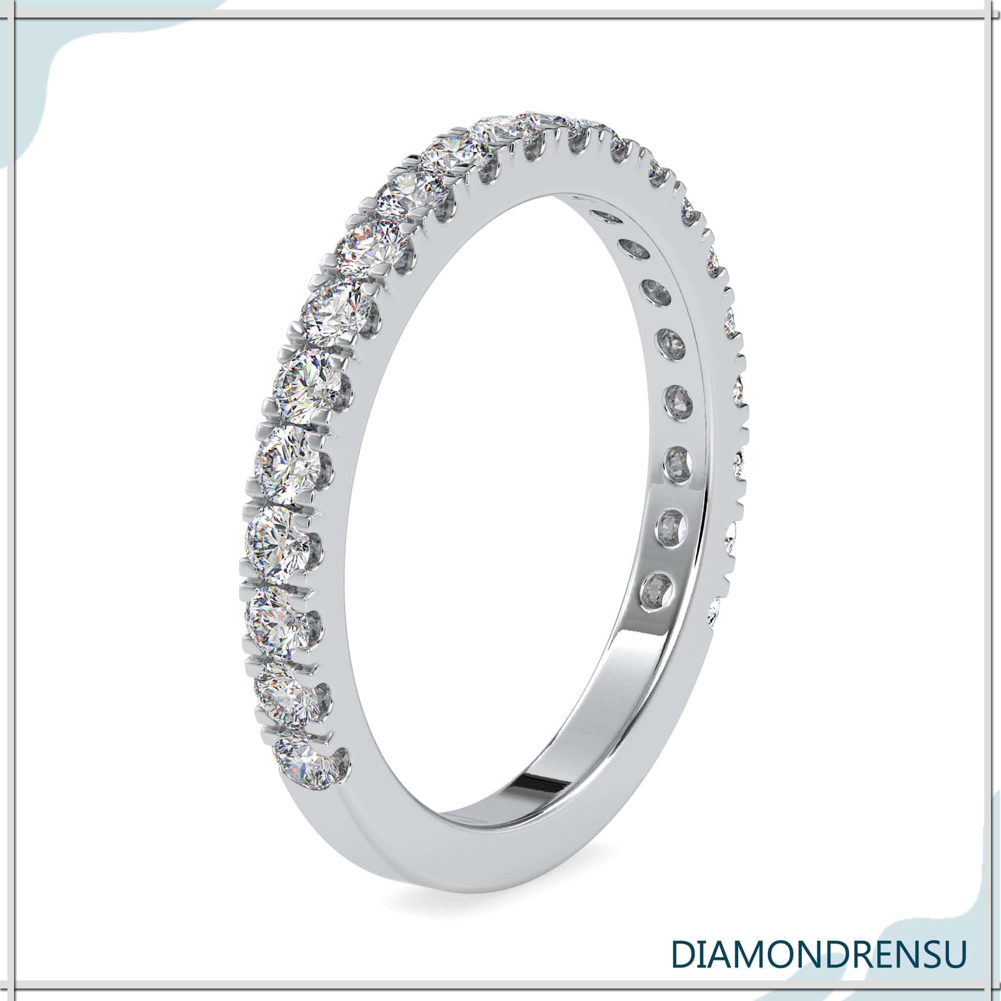 Lab grown diamond wedding band crafted in white gold.