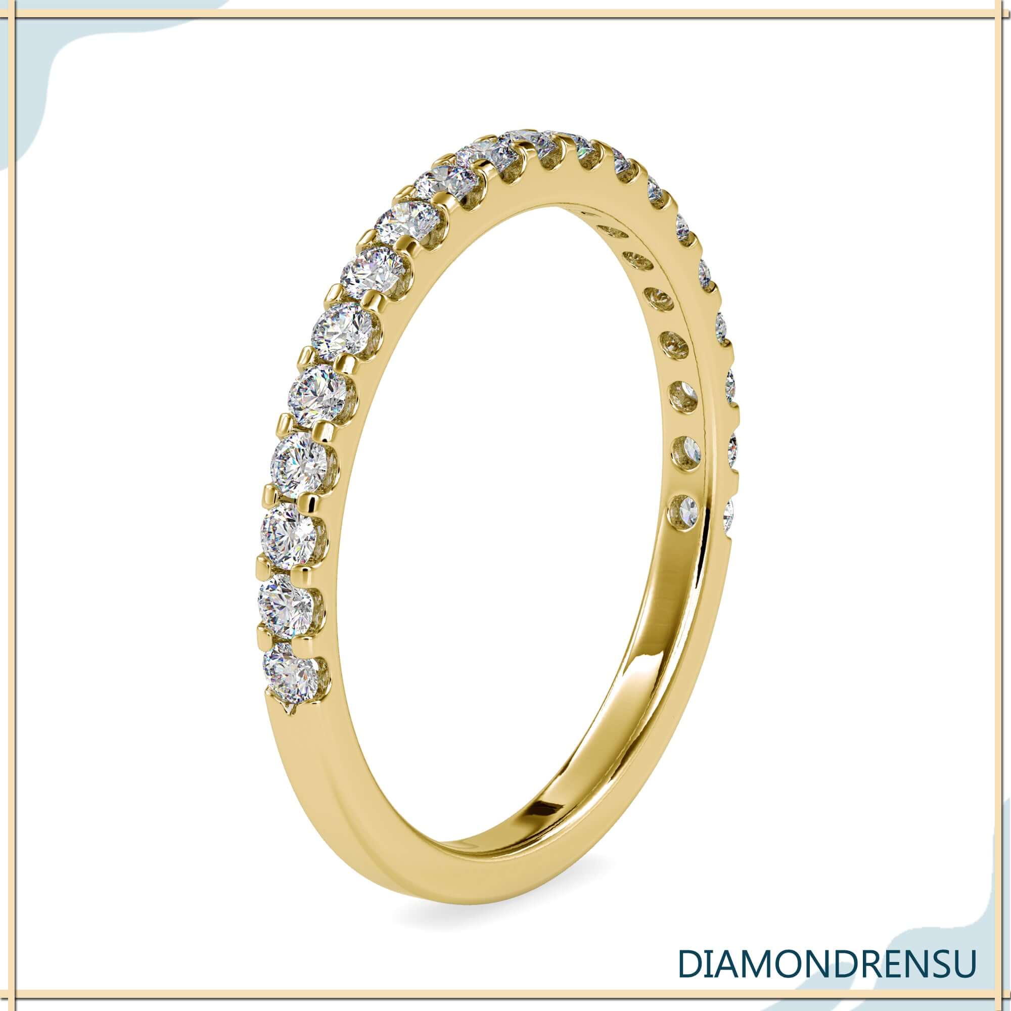 White gold half eternity ring with lab made diamonds.