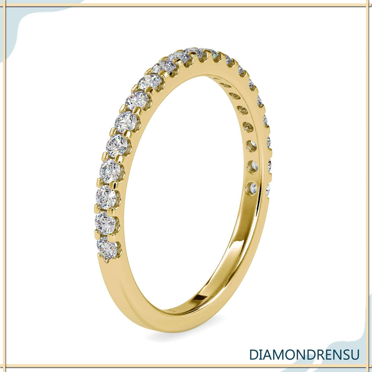 White gold half eternity ring with lab made diamonds.