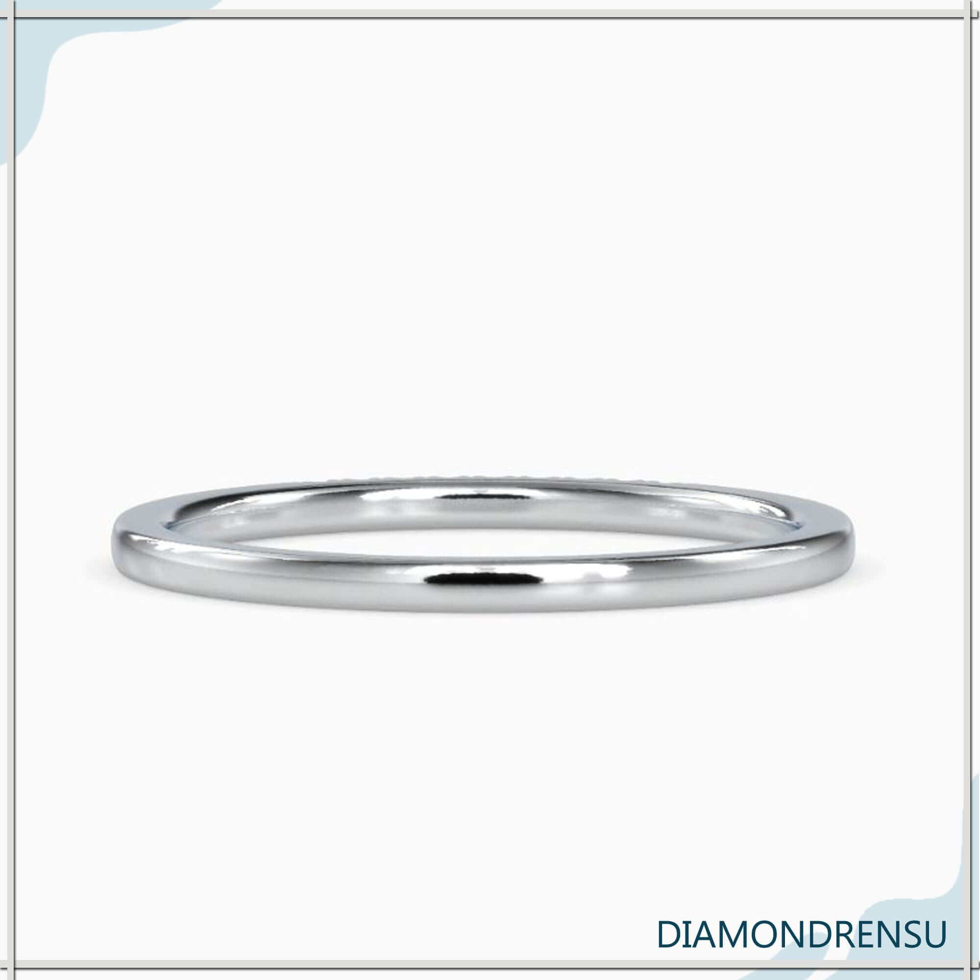 Handmade jewellery wedding band in gold setting.