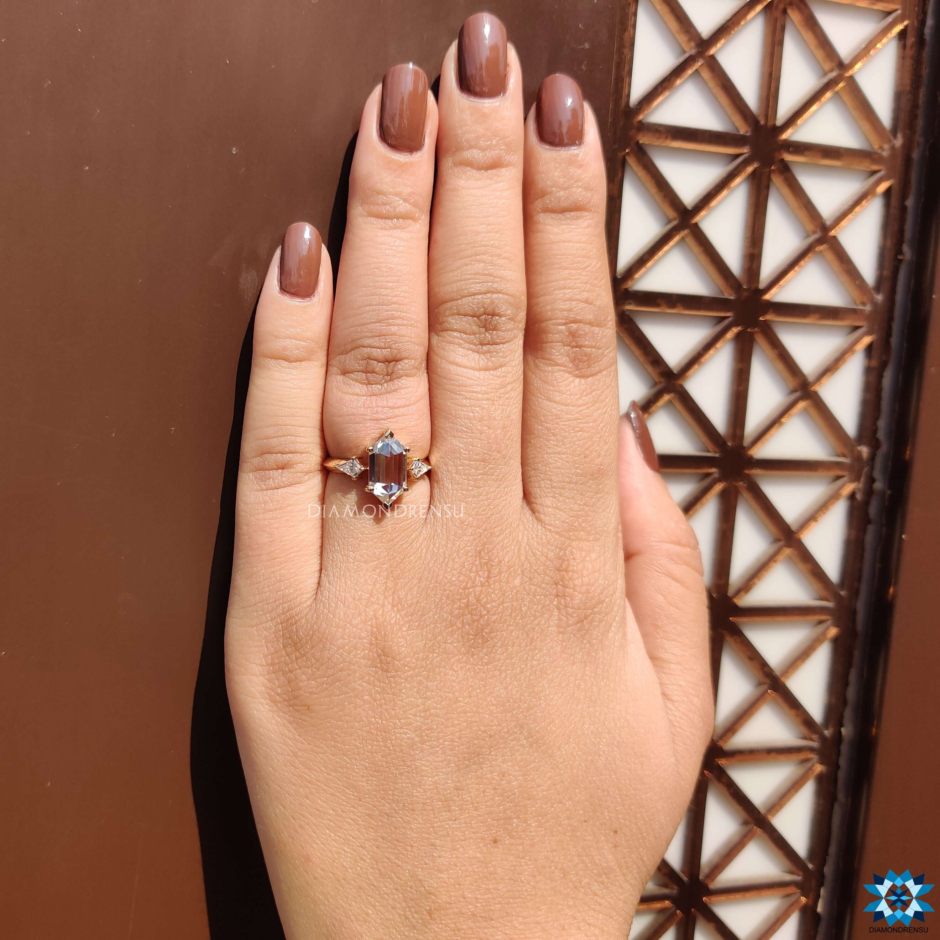 Handmade three stone moissanite ring.