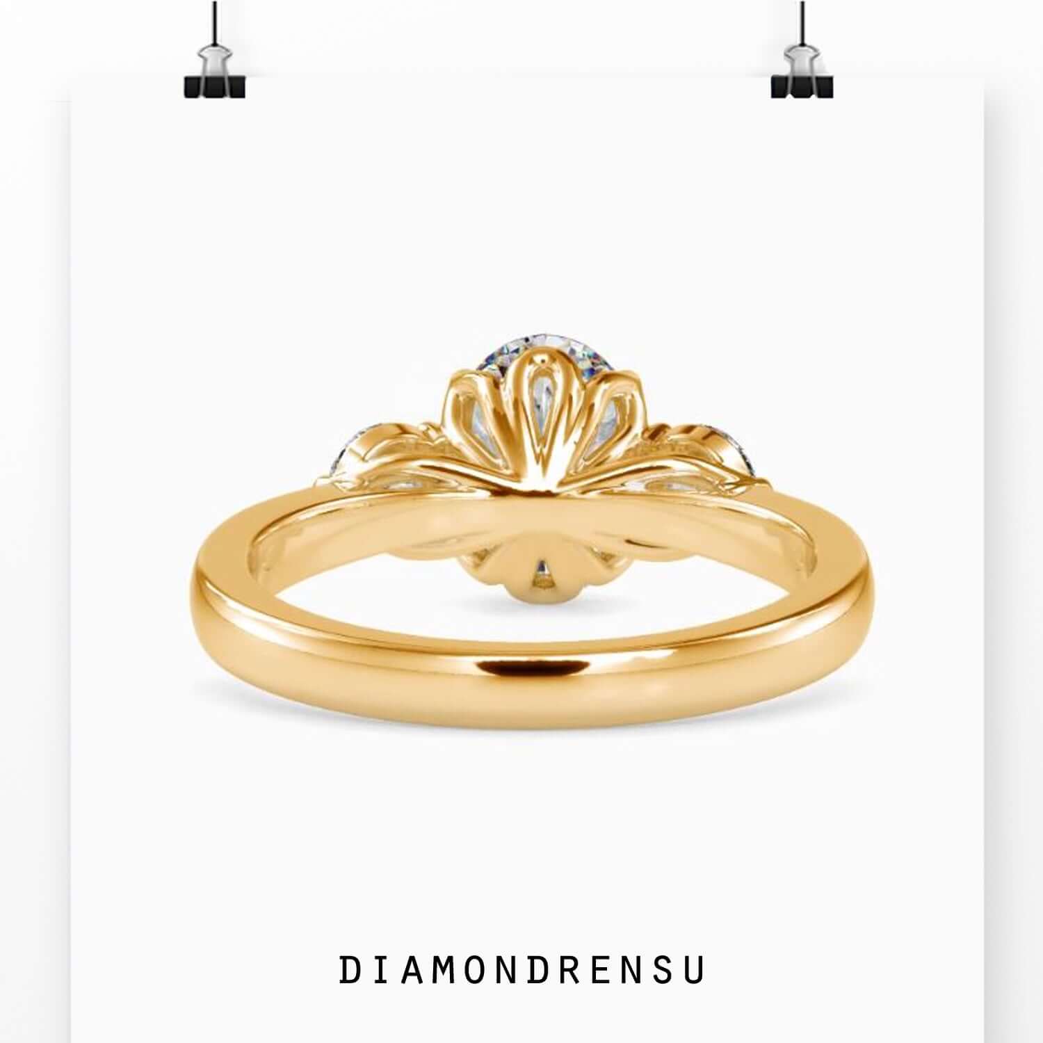 White gold diamond ring with tulip setting.