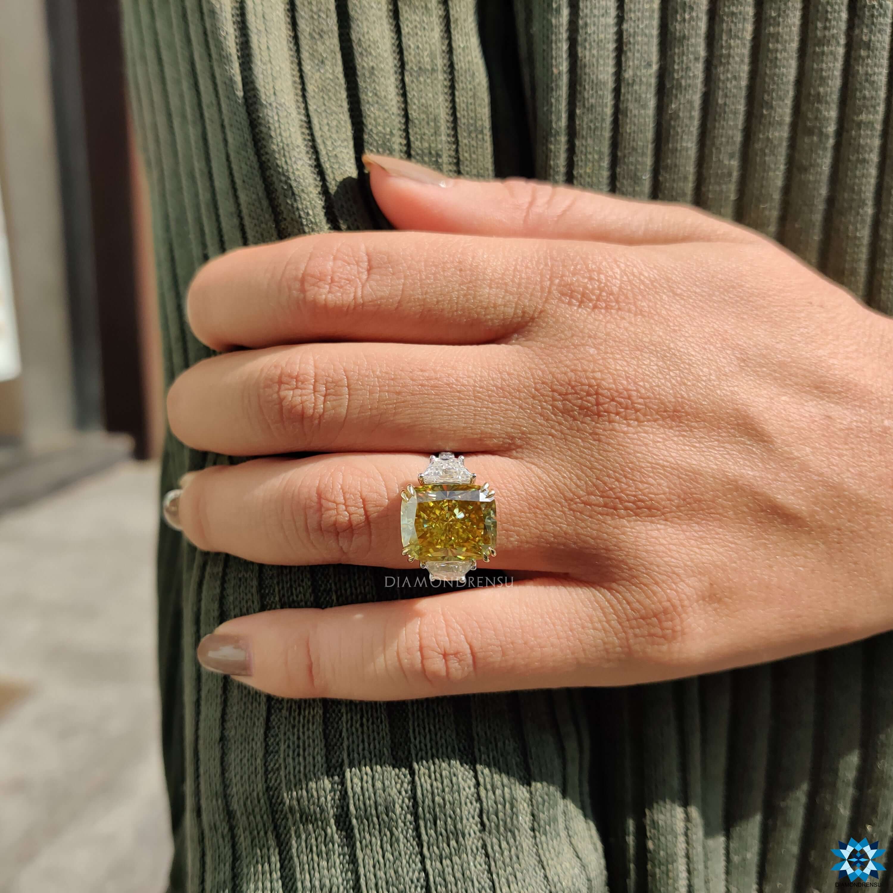 Buy moissanite ring with radiant cut and side stones.