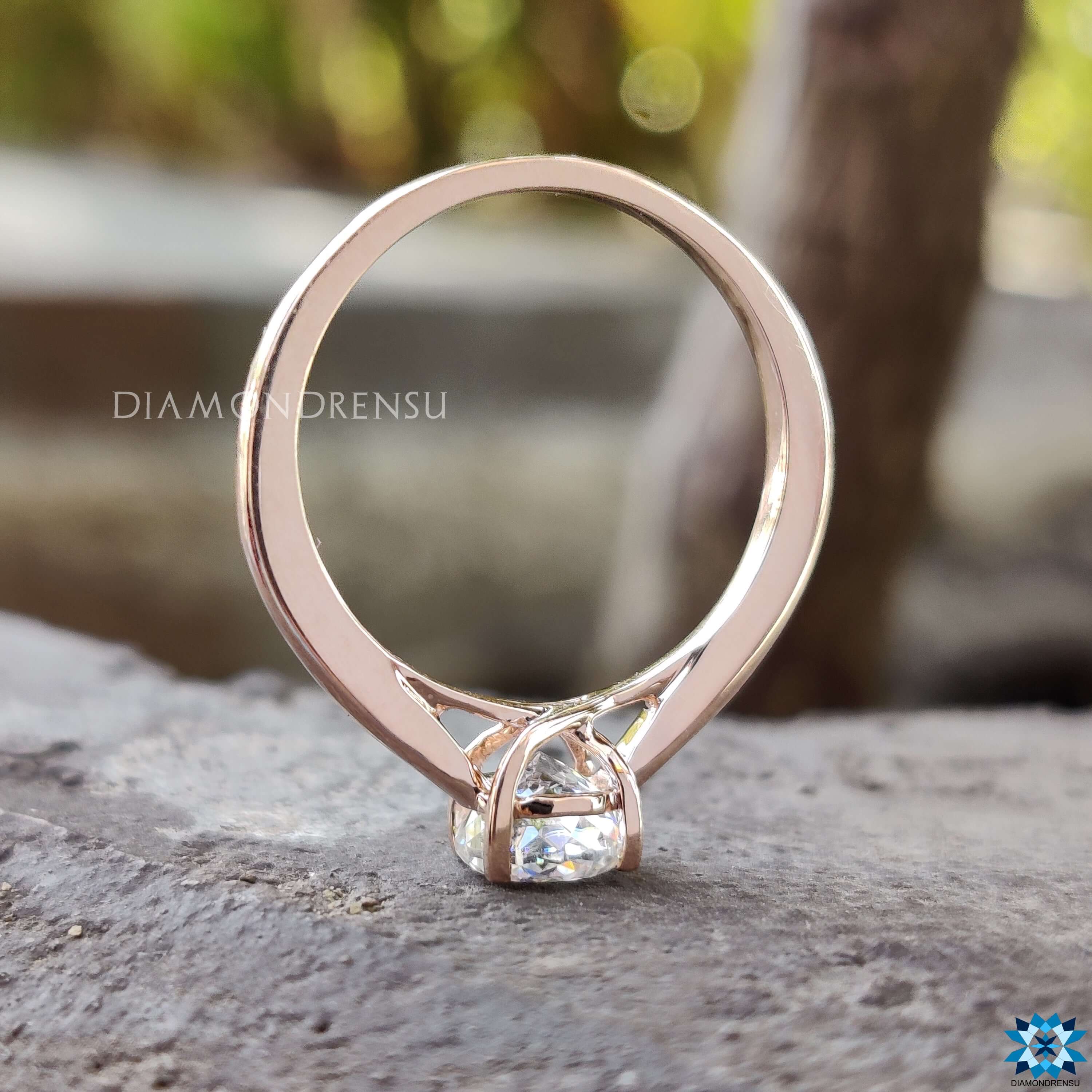 Prong set Portuguese moissanite ring.