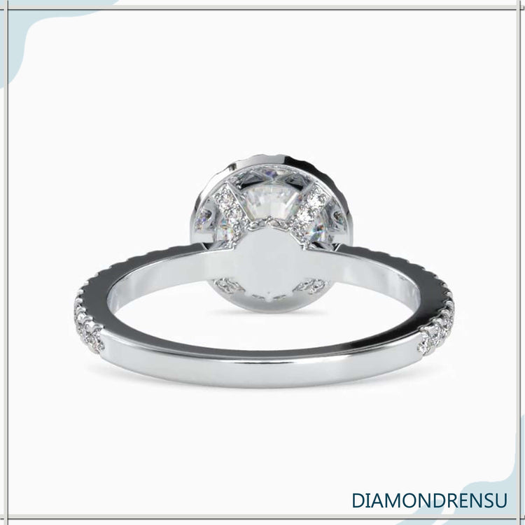 Simple diamond ring with handmade round prong setting.