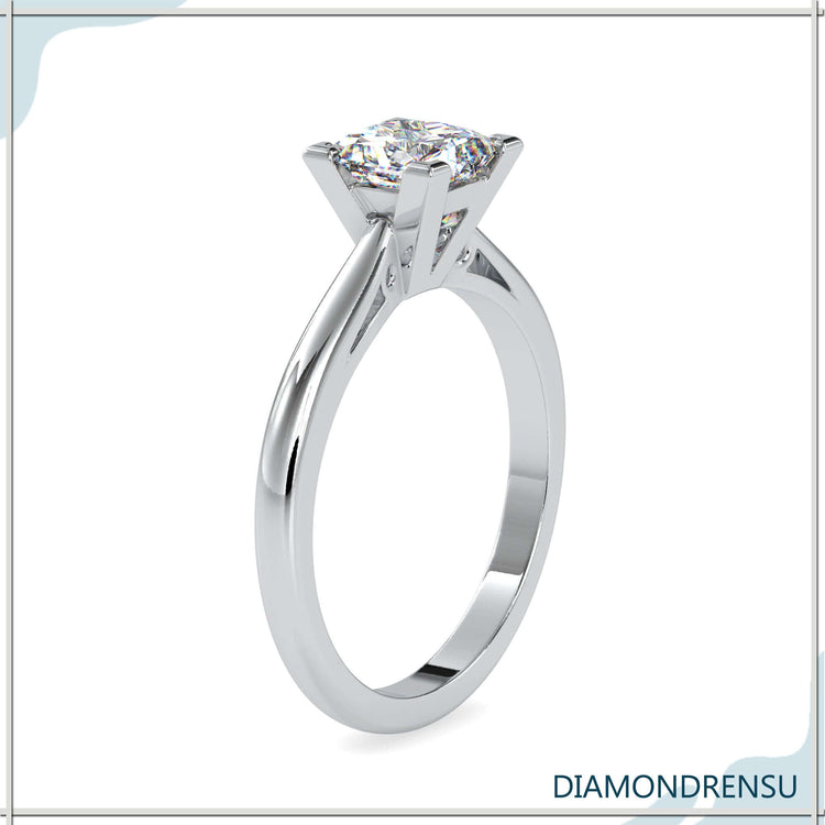Buy diamond ring featuring princess cut and 4 prong solitaire style.