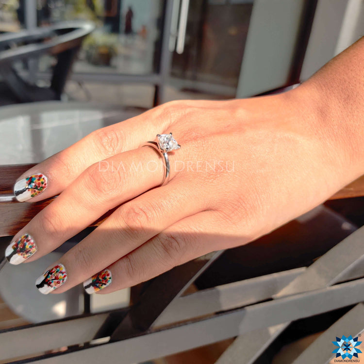 Moissanite Solitaire Ring with brilliant sparkle.