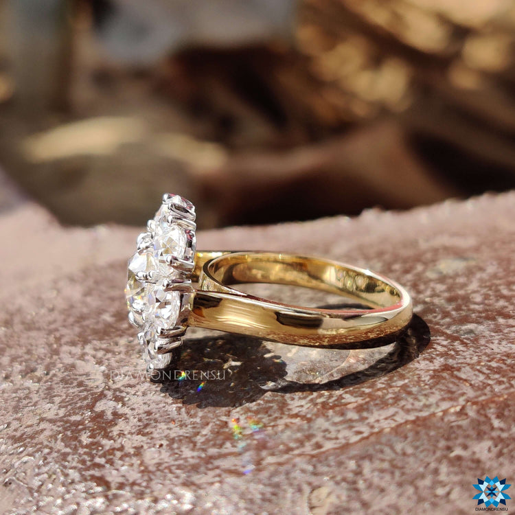 Custom engagement ring featuring an Old European cut center stone.