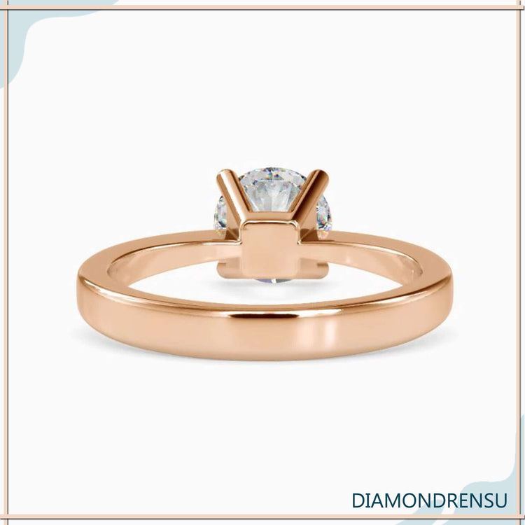 Handmade jewellery ring with round diamond and 4 prong style.