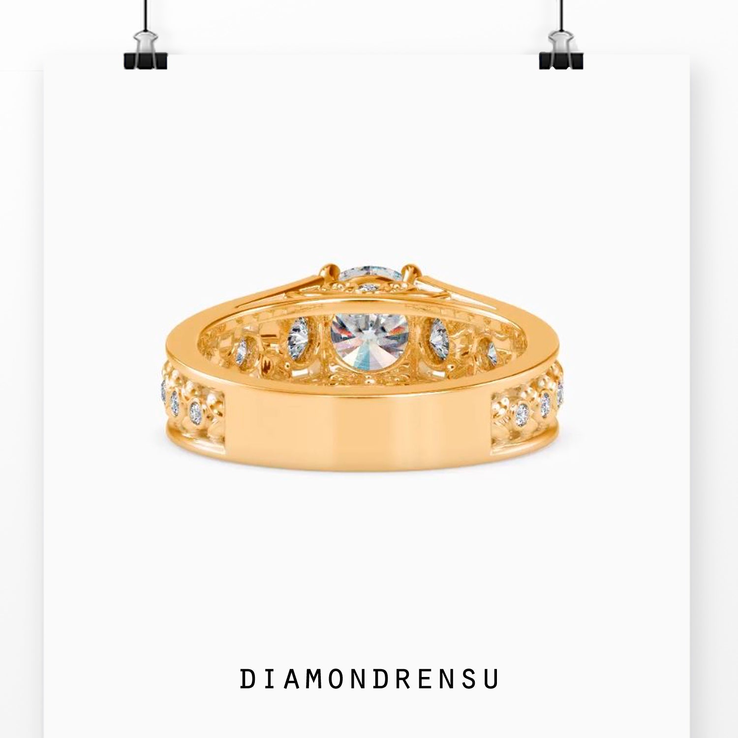 Vintage round diamond ring in rose gold setting.