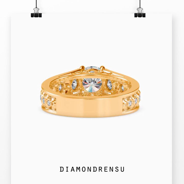 Vintage round diamond ring in rose gold setting.