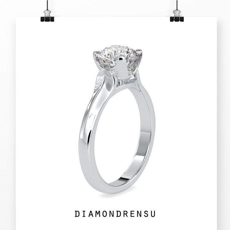 White gold engagement ring with solitaire diamond, IGI certified.