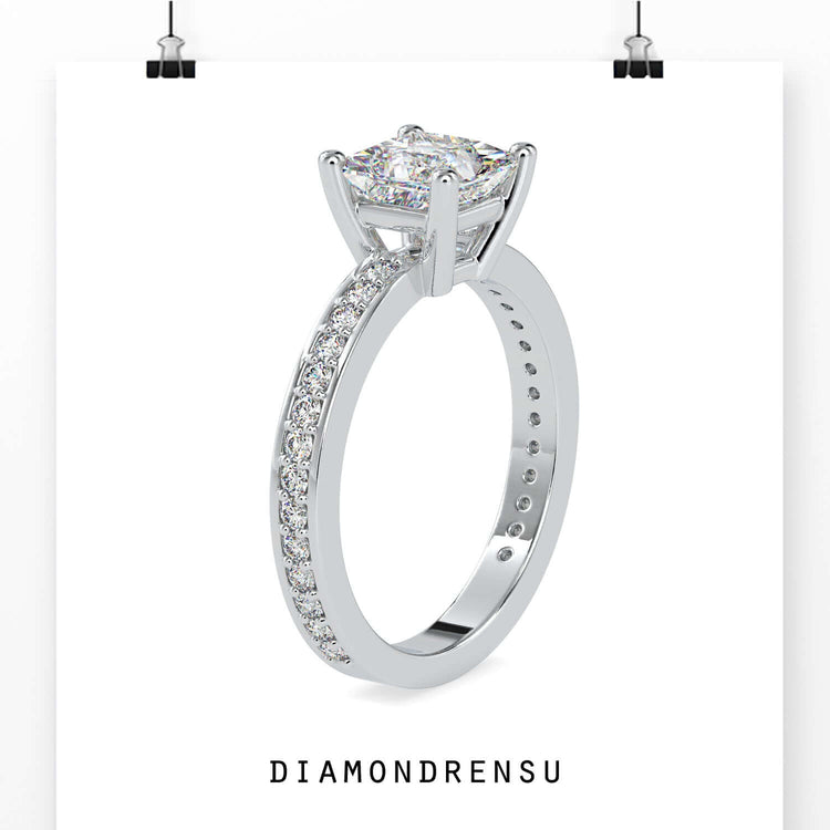Pave engagement ring in rose gold with handmade finish.