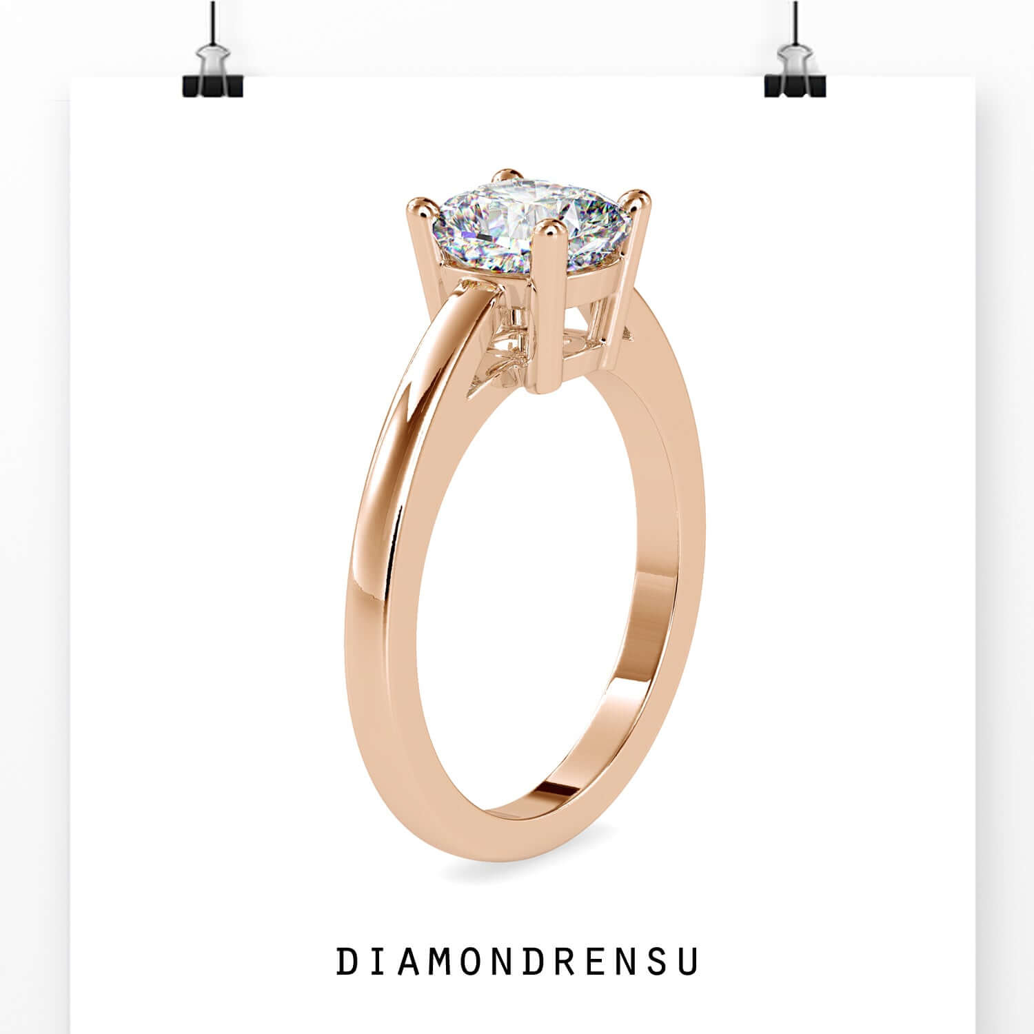 White gold engagement ring with a cushion cut diamond in a classic 4 prong setting.