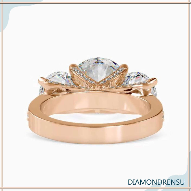 UK engagement ring with white gold and pave band design.