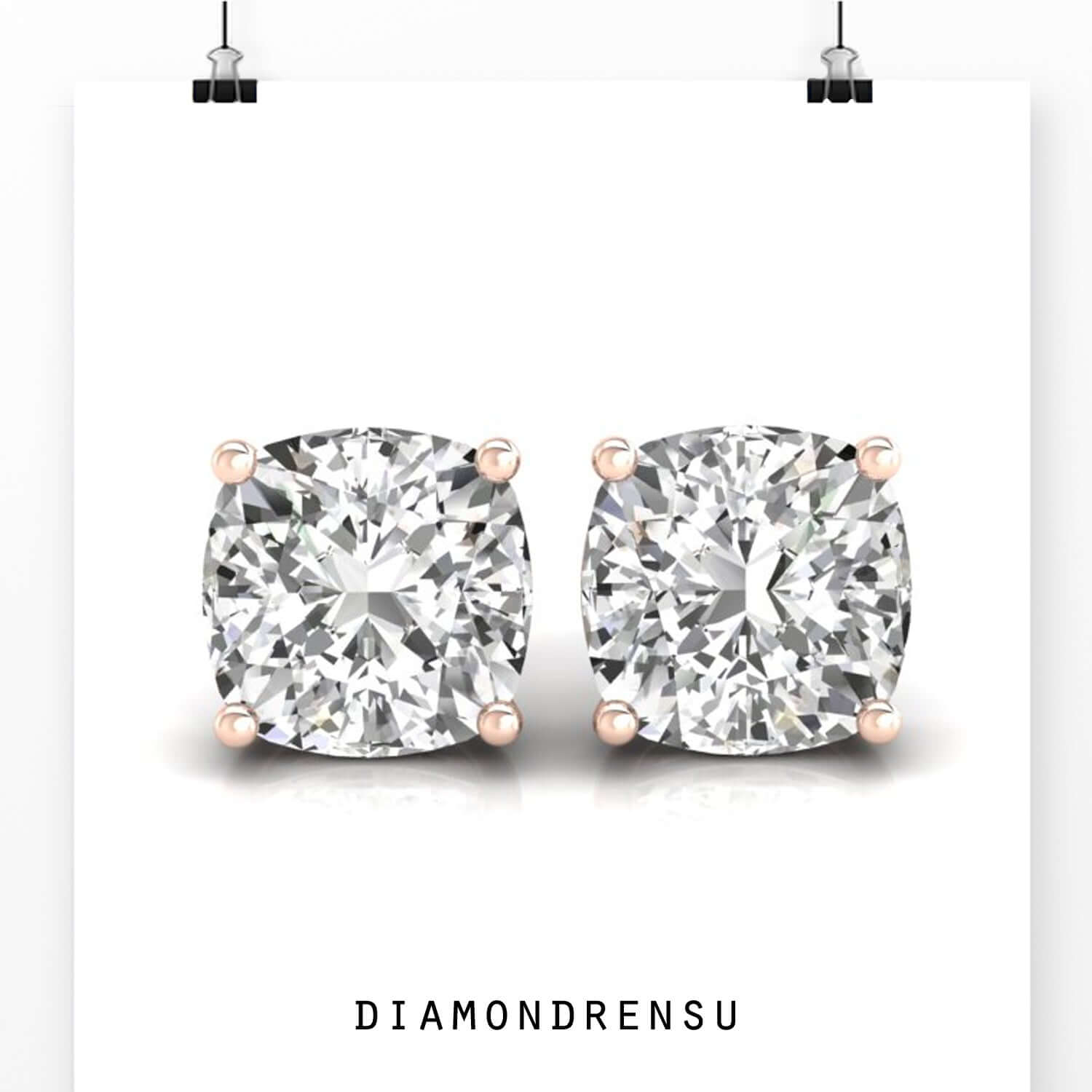 Cushion cut stud earrings in yellow gold finish.