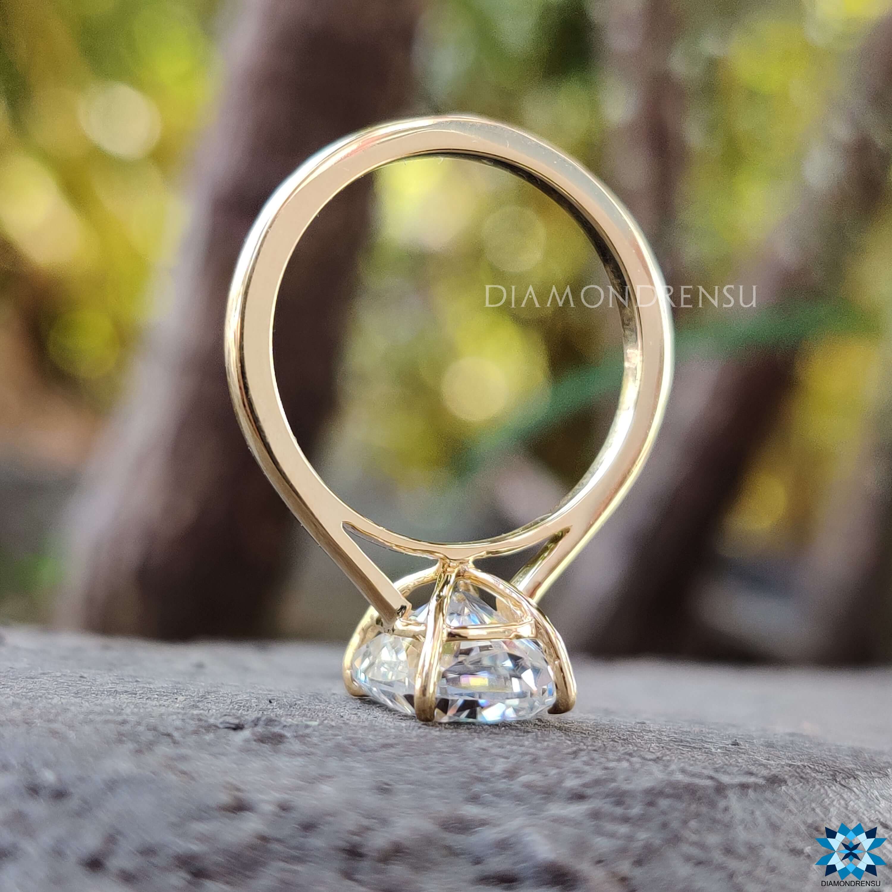 Moissanite engagement ring with a clean, minimalist design.