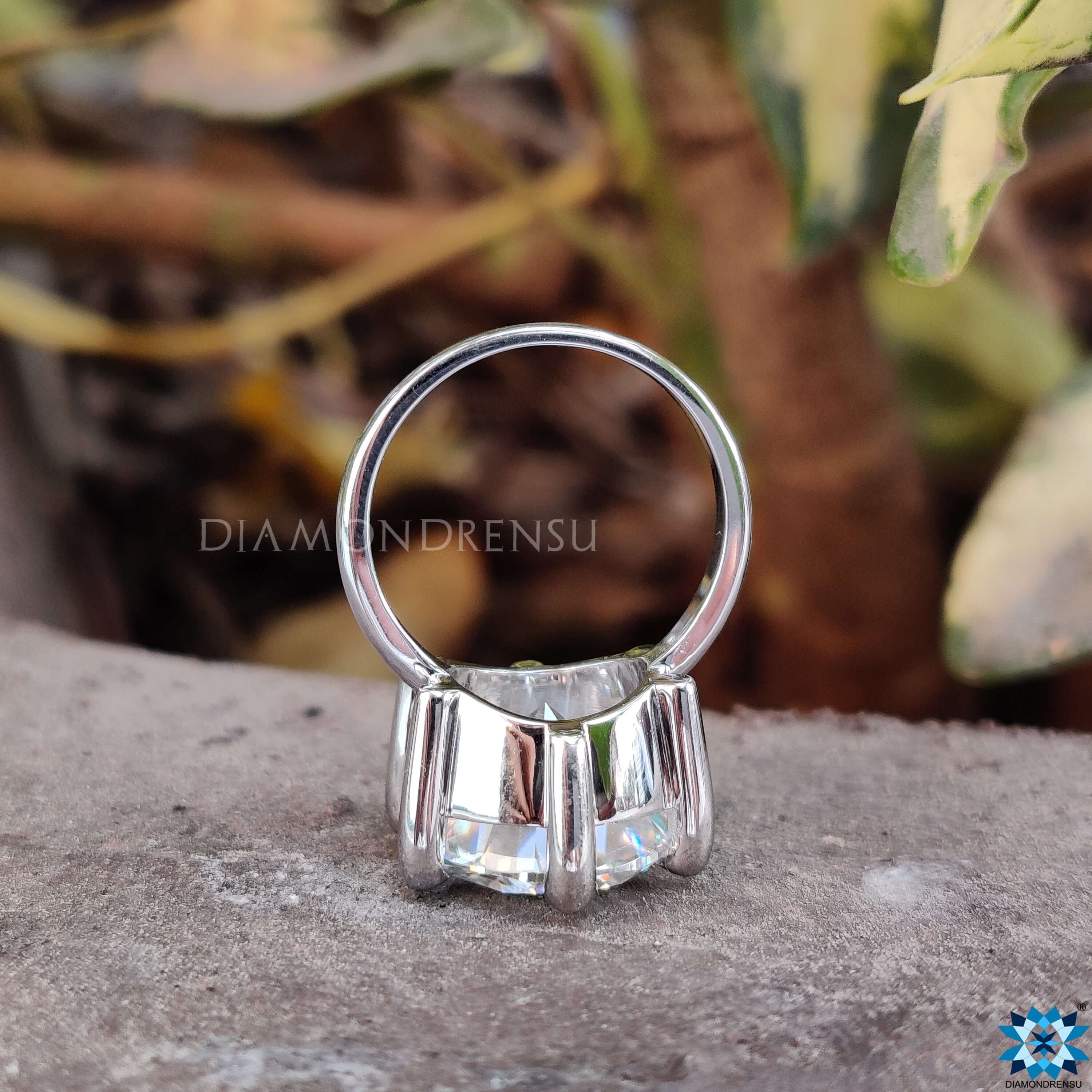 White gold ring with solitaire engagement ring style.