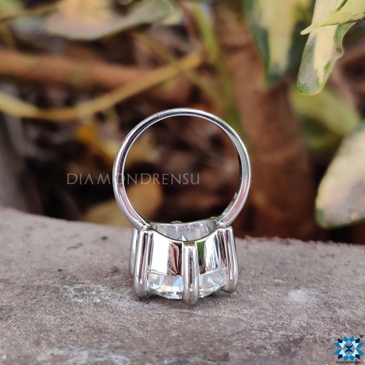 White gold ring with solitaire engagement ring style.