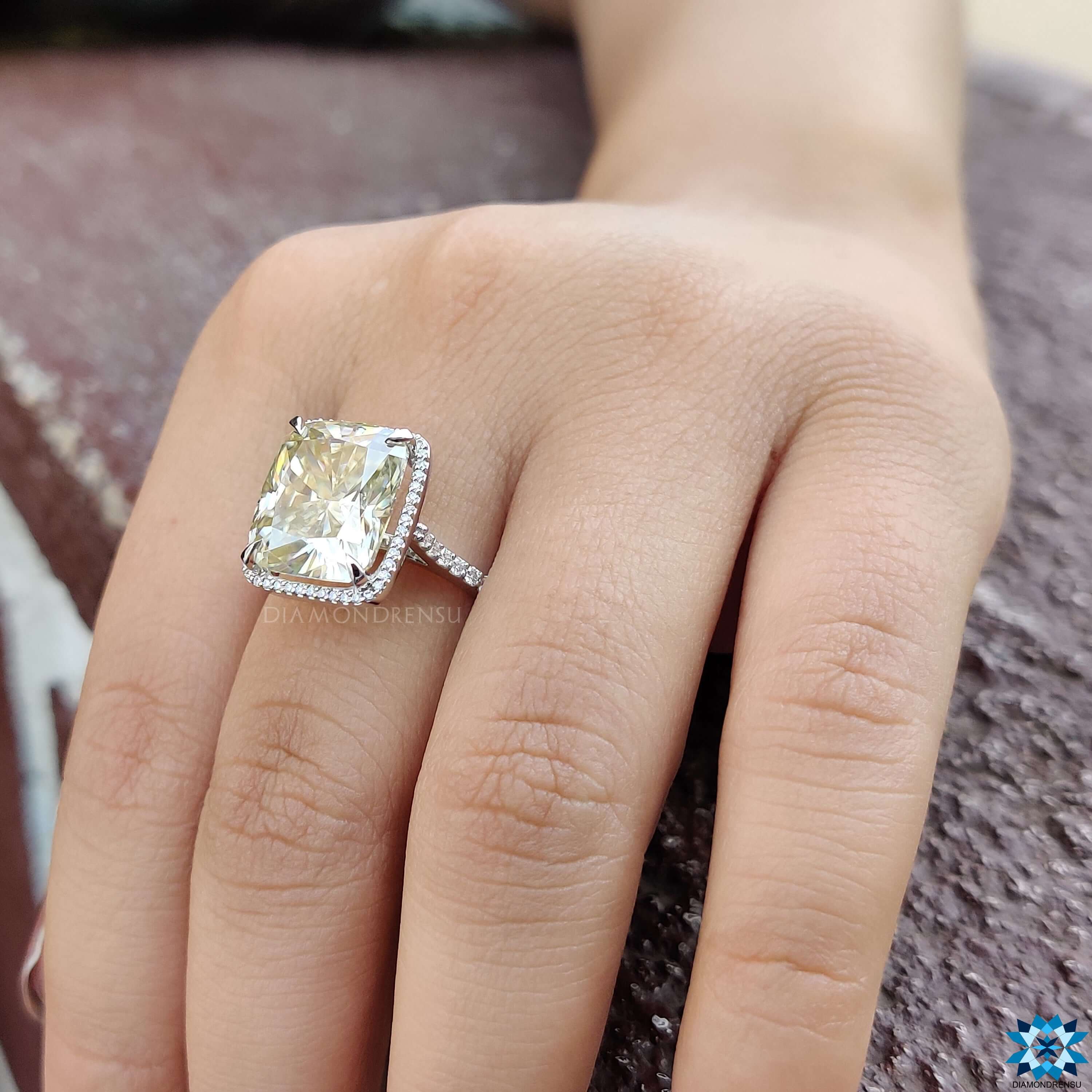 4 claw prong setting ring with cushion halo moissanite.