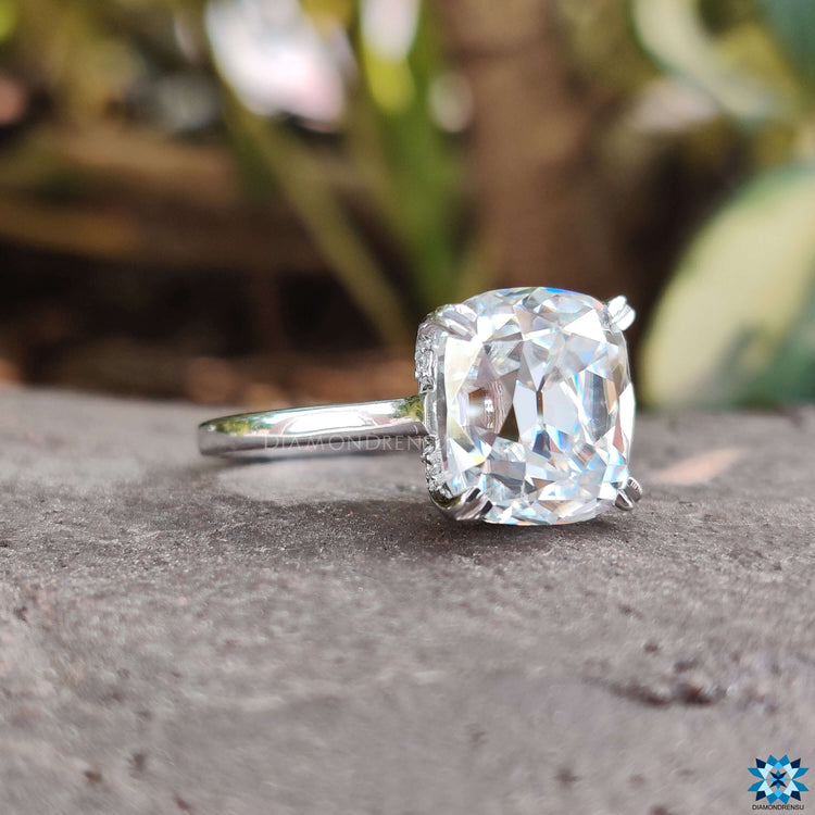 Hidden halo moissanite ring featuring a cushion cut engagement ring design for extra sparkle.