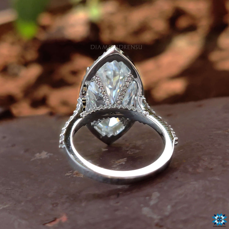 Pave setting ring with round cut pave band.
