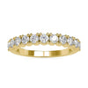 Gold half eternity band with shared prong round diamonds.