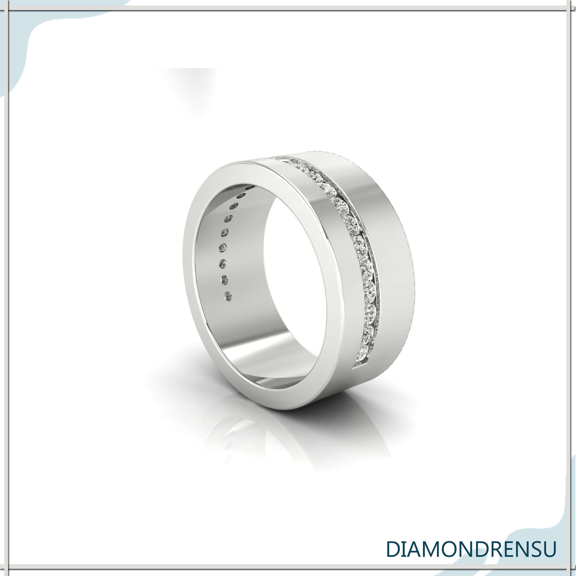Wide diamond band in rose gold with channel wedding band setting.