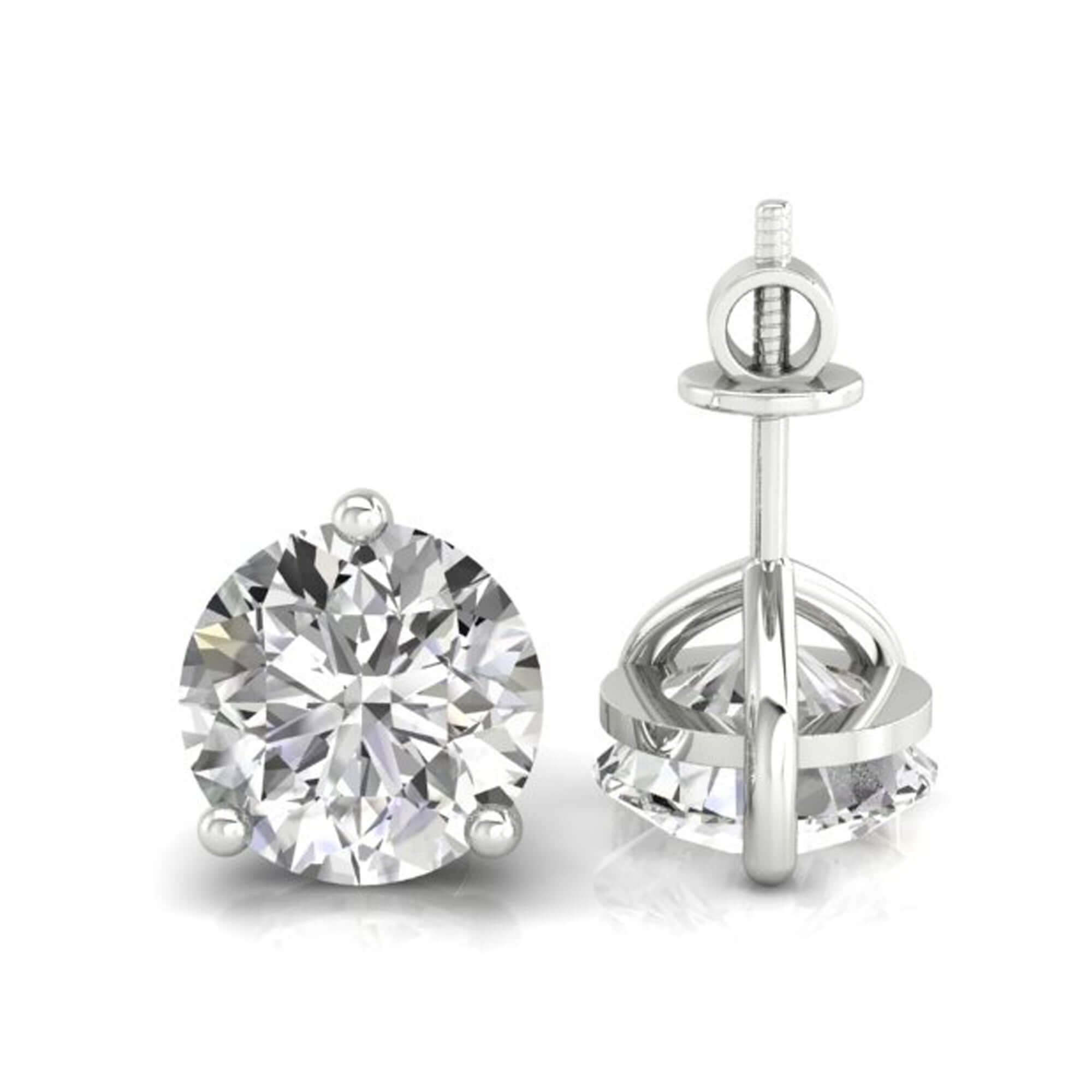 Handmade jewellery showcasing round diamond stud earrings in rose gold.