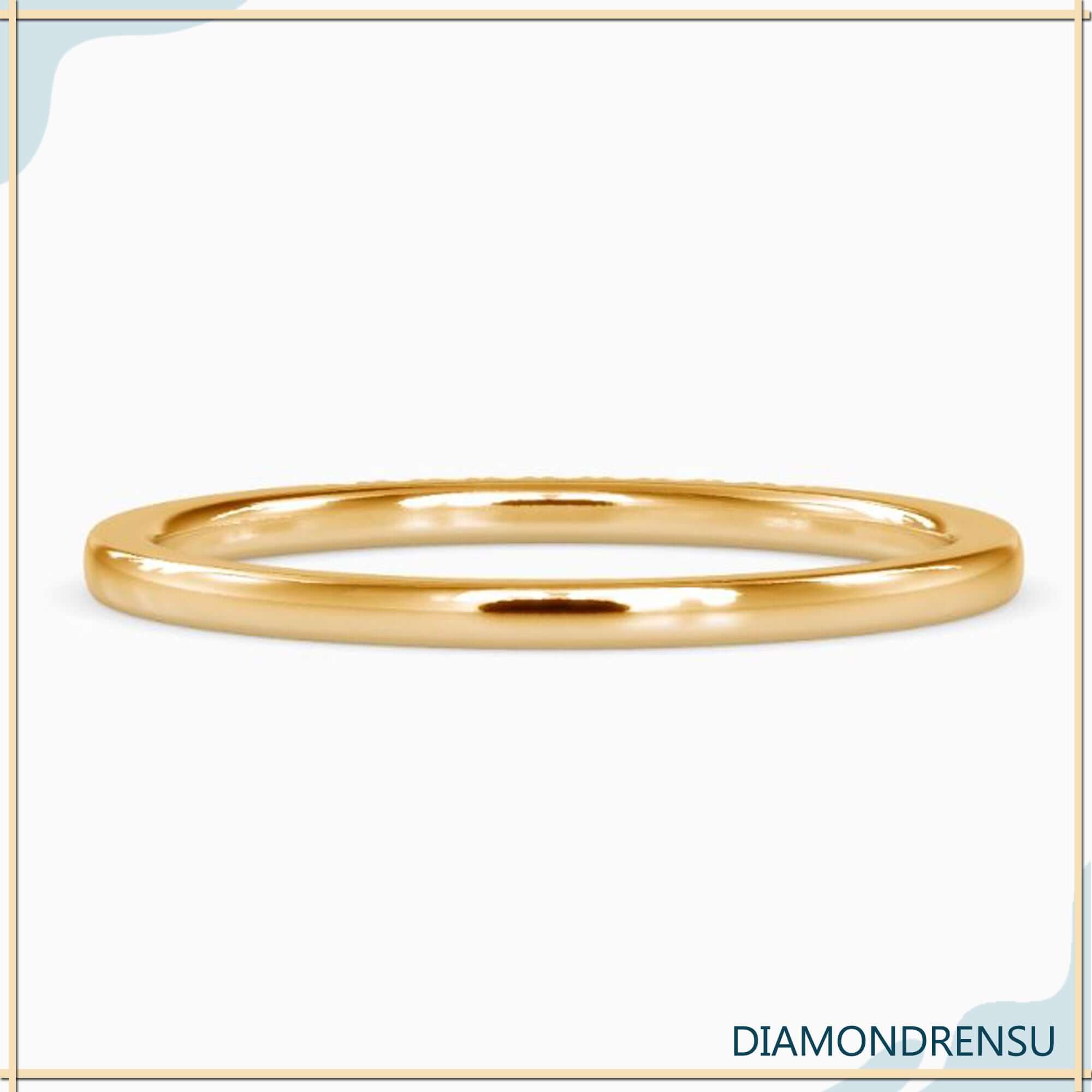 UK diamond wedding band crafted in rose gold.