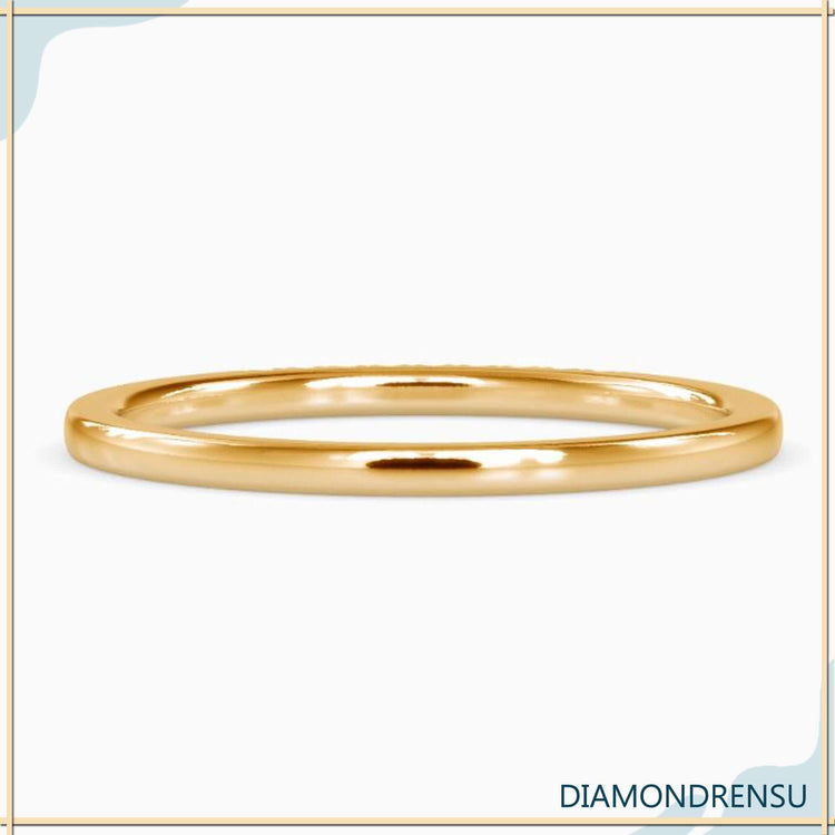 UK diamond wedding band crafted in rose gold.