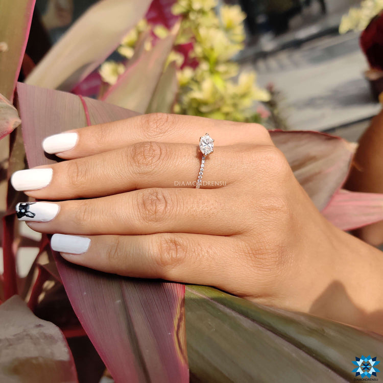 Horizontal marquise moissanite engagement ring.