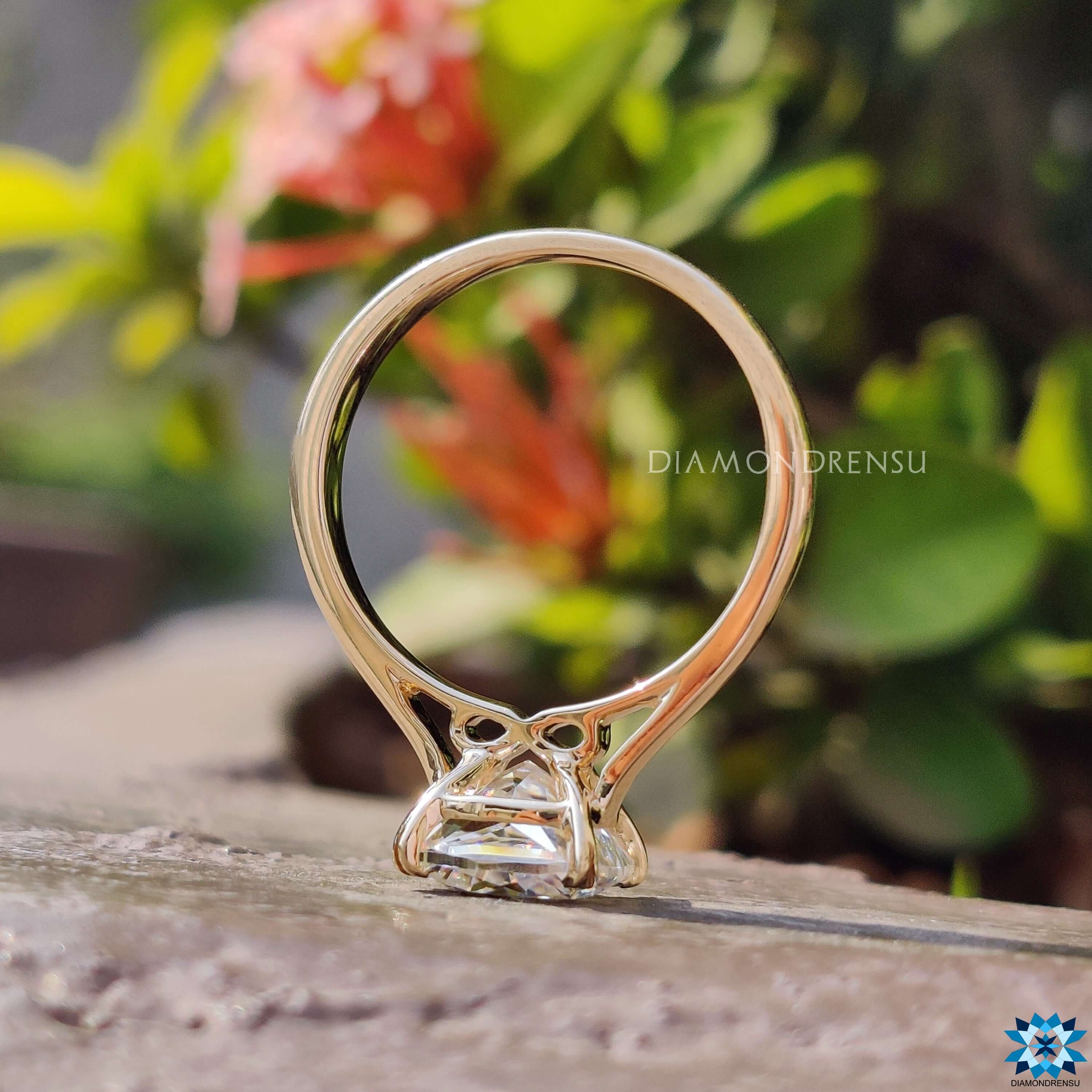 Handmade moissanite ring with prong setting.