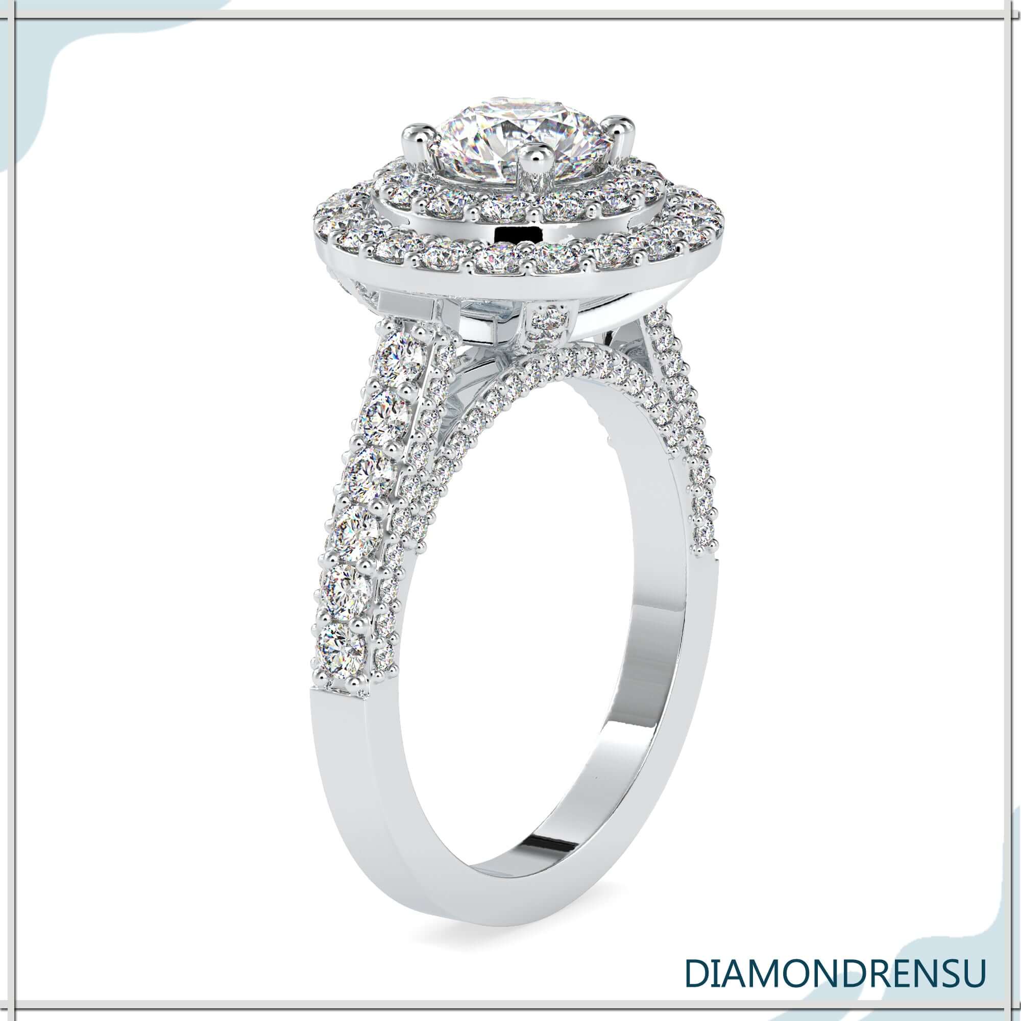 Simple diamond ring with double halo and round cut.