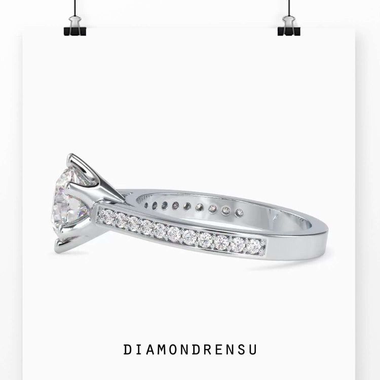 Lab grown diamond engagement ring in white gold with custom design.